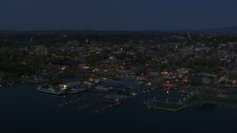 5.7K aerial stock footage a stationary view of city's downtown area and a marina at night, Burlington, Vermont Aerial Stock Footage | DX0002_226_019