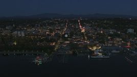 5.7K aerial stock footage focus on the city's downtown area lit up for the night while approaching, Burlington, Vermont Aerial Stock Footage | DX0002_226_027