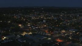 5.7K aerial stock footage focus on the city's downtown area lit up for the night while circling city, Burlington, Vermont Aerial Stock Footage | DX0002_226_030
