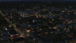 5.7K aerial stock footage of the downtown area lit up for nighttime, Burlington, Vermont Aerial Stock Footage | DX0002_226_031