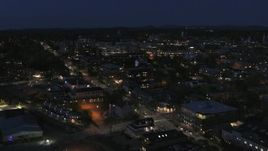 5.7K aerial stock footage orbit the downtown area lit up for nighttime and descend, Burlington, Vermont Aerial Stock Footage | DX0002_226_033