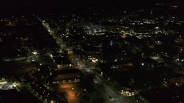 5.7K aerial stock footage fly around office buildings by Battery Street at night, Burlington, Vermont Aerial Stock Footage | DX0002_226_057