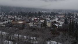 5.7K aerial stock footage ascend from trees to reveal the small town, Leavenworth, Washington Aerial Stock Footage | DX0002_227_008