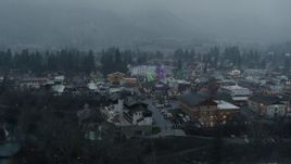 5.7K aerial stock footage of orbiting the town with Christmas trees, Leavenworth, Washington Aerial Stock Footage | DX0002_227_029