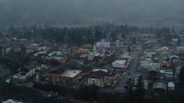 5.7K aerial stock footage of an orbit of tall Christmas trees in the center of town, Leavenworth, Washington Aerial Stock Footage | DX0002_227_031