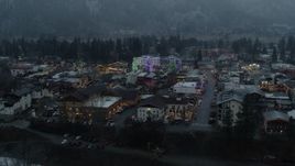 5.7K aerial stock footage fly around a small town while focused on Christmas trees, Leavenworth, Washington Aerial Stock Footage | DX0002_227_043