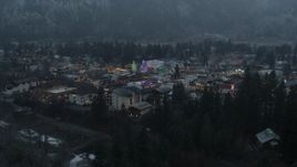 5.7K aerial stock footage orbiting a small town while focused on Christmas trees and lights, Leavenworth, Washington Aerial Stock Footage | DX0002_227_044