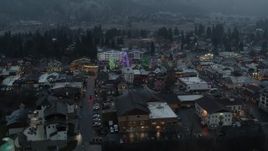 5.7K aerial stock footage circling a small town while focused on Christmas trees and lights, Leavenworth, Washington Aerial Stock Footage | DX0002_227_045
