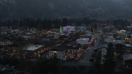 5.7K aerial stock footage of a small town decorated with Christmas trees and lights, Leavenworth, Washington Aerial Stock Footage | DX0002_227_053