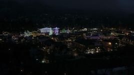 5.7K aerial stock footage slowly flying around Christmas trees and lights at night, Leavenworth, Washington Aerial Stock Footage | DX0002_228_023