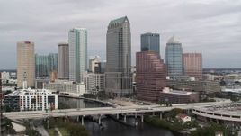 5.7K aerial stock footage of flying away from tall skyscrapers in Downtown Tampa, Florida Aerial Stock Footage | DX0003_229_003