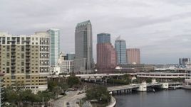 5.7K aerial stock footage fly low around apartments, reveal tall skyscrapers, Downtown Tampa, Florida Aerial Stock Footage | DX0003_229_005