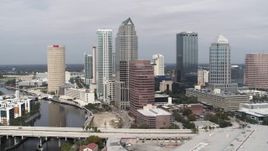 5.7K aerial stock footage of flying away from skyscrapers, Downtown Tampa, Florida Aerial Stock Footage | DX0003_229_006