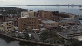 5.7K aerial stock footage of orbiting a waterfront hospital in Tampa, Florida Aerial Stock Footage | DX0003_229_017