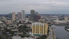 5.7K aerial stock footage flying by condo complex with view of Downtown Tampa, Florida Aerial Stock Footage | DX0003_229_031