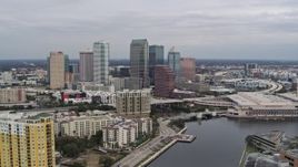 5.7K aerial stock footage stationary view of skyline from a channel, Downtown Tampa, Florida Aerial Stock Footage | DX0003_229_034
