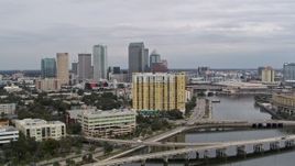 5.7K aerial stock footage the city skyline seen while flying away from condo complex, Downtown Tampa, Florida Aerial Stock Footage | DX0003_229_036