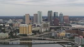 5.7K aerial stock footage of the skyline, seen from bridges and channel near condos, Downtown Tampa, Florida Aerial Stock Footage | DX0003_230_009