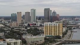 5.7K aerial stock footage of the skyline, seen while passing condos, Downtown Tampa, Florida Aerial Stock Footage | DX0003_230_010