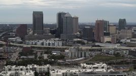 5.7K aerial stock footage of passing by the downtown skyline, Downtown Tampa, Florida Aerial Stock Footage | DX0003_230_024