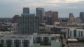 5.7K aerial stock footage of flying by downtown skyline, reveal apartment complex, Downtown Tampa, Florida Aerial Stock Footage | DX0003_230_026