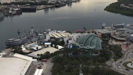 5.7K aerial stock footage of orbiting a warship museum and aquarium in Tampa, Florida Aerial Stock Footage | DX0003_230_032
