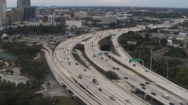 5.7K aerial stock footage flyby and away from freeway traffic in Tampa, Florida Aerial Stock Footage | DX0003_231_003