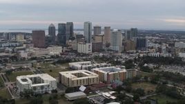 5.7K aerial stock footage a wide view of passing by tall skyscrapers in the city's skyline, Downtown Tampa, Florida Aerial Stock Footage | DX0003_231_007