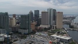 5.7K aerial stock footage approach and orbit skyscrapers by the river, Downtown Tampa, Florida Aerial Stock Footage | DX0003_231_016