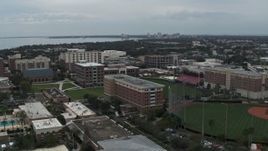 5.7K aerial stock footage descend and fly away from the University of Tampa campus, Florida Aerial Stock Footage | DX0003_231_022