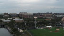 5.7K aerial stock footage approach and ascend toward the University of Tampa campus, Florida Aerial Stock Footage | DX0003_231_023