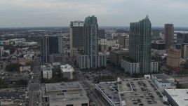 5.7K aerial stock footage of a reverse view of a pair of high-rise buildings in Downtown Tampa, Florida Aerial Stock Footage | DX0003_231_036