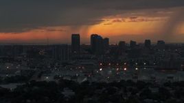 5.7K aerial stock footage fly away from and past the Downtown Tampa skyline at twilight, Florida Aerial Stock Footage | DX0003_232_006