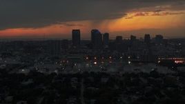 5.7K aerial stock footage of passing the Downtown Tampa skyline at twilight, Florida Aerial Stock Footage | DX0003_232_008