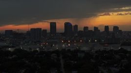 5.7K aerial stock footage a reverse view of the Downtown Tampa skyline at twilight, Florida Aerial Stock Footage | DX0003_232_012
