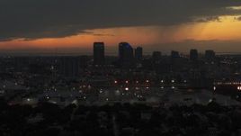 5.7K aerial stock footage slowly fly away from skyscrapers in the Downtown Tampa skyline at twilight, Florida Aerial Stock Footage | DX0003_232_017
