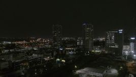 5.7K aerial stock footage of approaching office buildings at night, Downtown Tampa, Florida Aerial Stock Footage | DX0003_232_023