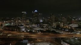 5.7K aerial stock footage of orbiting skyscrapers at night in Downtown Tampa, Florida Aerial Stock Footage | DX0003_232_025
