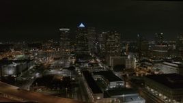 5.7K aerial stock footage of circling skyscrapers at night in Downtown Tampa, Florida Aerial Stock Footage | DX0003_232_026