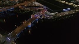 5.7K aerial stock footage police cars on the bridge by convention center at night in Downtown Tampa, Florida Aerial Stock Footage | DX0003_232_052
