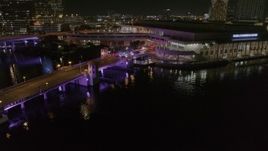 5.7K aerial stock footage orbit police cars on a bridge by convention center at night in Downtown Tampa, Florida Aerial Stock Footage | DX0003_232_054