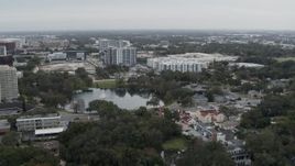 5.7K aerial stock footage of orbiting Lake Dot and apartment buildings in Orlando, Florida Aerial Stock Footage | DX0003_233_017