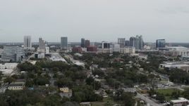 5.7K aerial stock footage wide view of the city's skyline, Downtown Orlando, Florida Aerial Stock Footage | DX0003_233_045