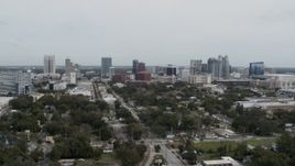 5.7K aerial stock footage of slowly flying by the city's skyline, Downtown Orlando, Florida Aerial Stock Footage | DX0003_233_046