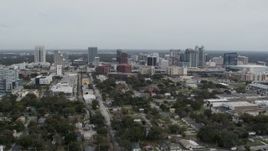 5.7K aerial stock footage of passing the city's skyline, Downtown Orlando, Florida Aerial Stock Footage | DX0003_233_051