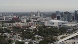 GLITCH 5.7K aerial stock footage of an apartment complex, Amway Center and city skyline, Downtown Orlando, Florida Aerial Stock Footage | DX0003_234_019