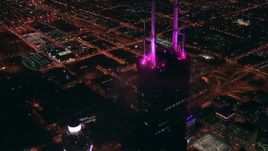 HD stock footage aerial video approach and tilt to the top of Willis Tower skyscraper at night, Downtown Chicago, Illinois Aerial Stock Footage | ED0001_000020