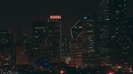 HD stock footage aerial video zoom to a wider view of skyscrapers at night, Downtown Chicago, Illinois Aerial Stock Footage | ED0001_000032