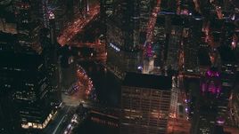 HD stock footage aerial video zoom to a wider view of the Chicago River and Trump Tower skyscraper at night, Downtown Chicago, Illinois Aerial Stock Footage | ED0001_000040