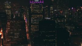 HD stock footage aerial video zoom to a wider view of skyscrapers at night in Downtown Chicago, Illinois Aerial Stock Footage | ED0001_000059
